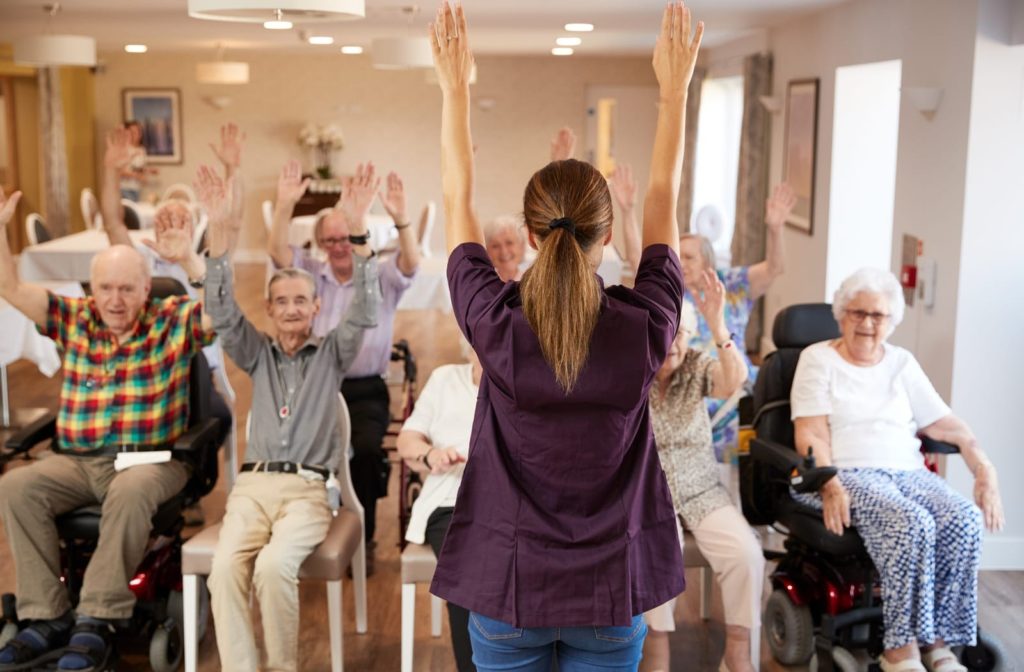 A group of seniors in Memory Care doing activities to improve cognition